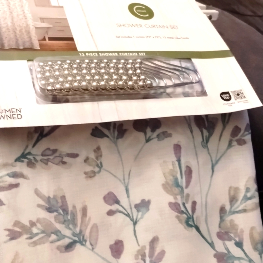 Shower curtain with hooks